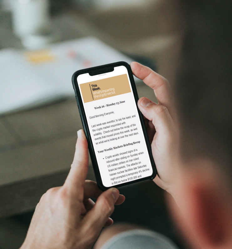 Person reading the Sandmark newsletter