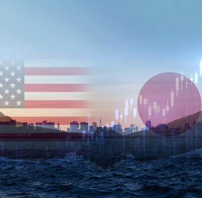 US & Japan flags against Tokyo backdrop and chart pattern